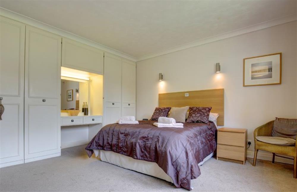 Master bedroom has double bed at Rossmore, Holme-next-the-Sea near Hunstanton