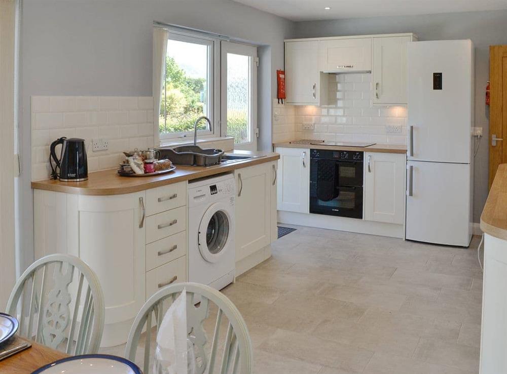 Fully fitted kitchen with open plan dining at Rotherwood in Portinscale, near Keswick, Cumbria
