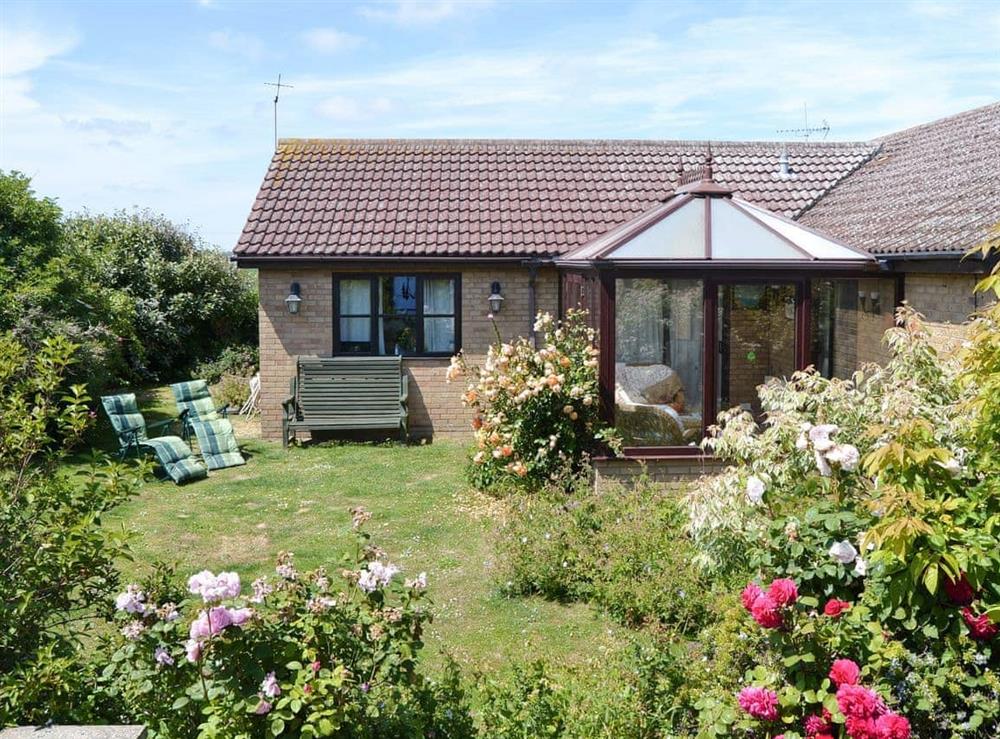 Detached holiday bungalow at Rothiemay in Walcott, Norfolk