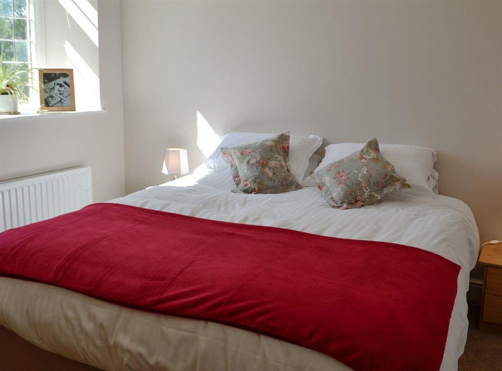 Comfortable double bedroom (photo 2) at The Farmhouse, 