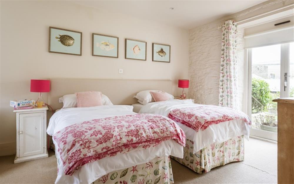 One of the twin bedrooms  at Round House, Court Barton in South Huish