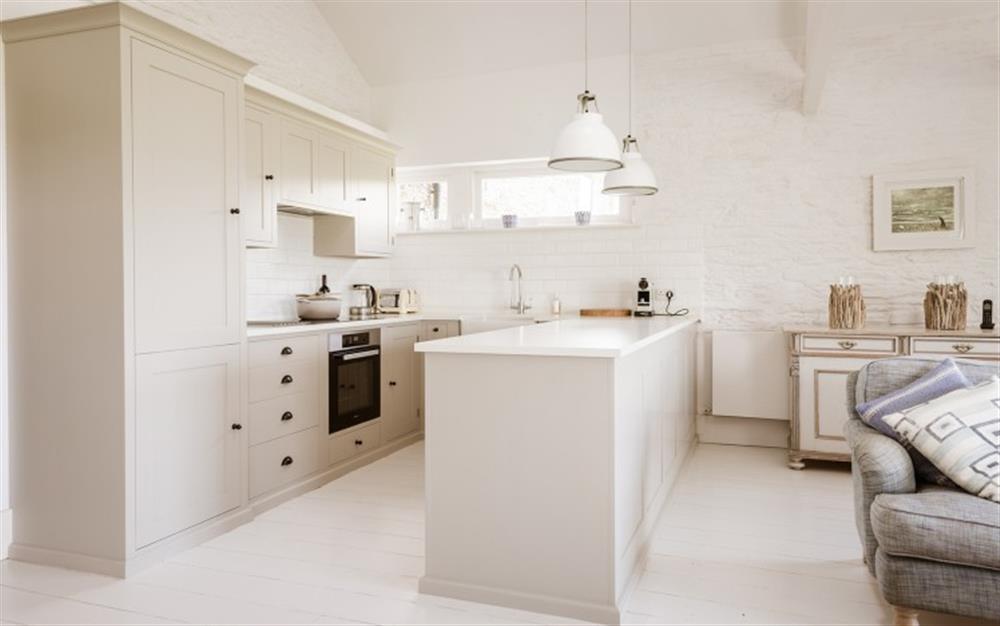 The modern kitchen at Round House, Court Barton in South Huish