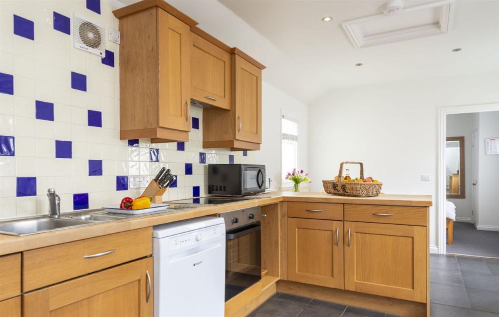The kitchen has been refurbished since image taken and a breakfast bar has replaced the breakfast table