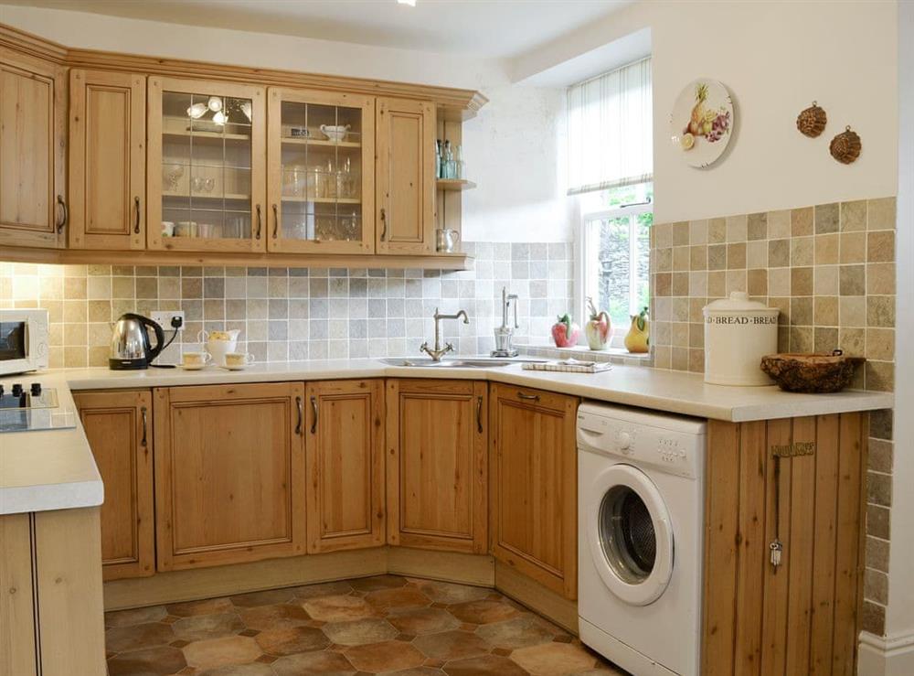 Fully-equipped fitted kitchen at Roundhill Cottages 1 in Ambleside, Cumbria