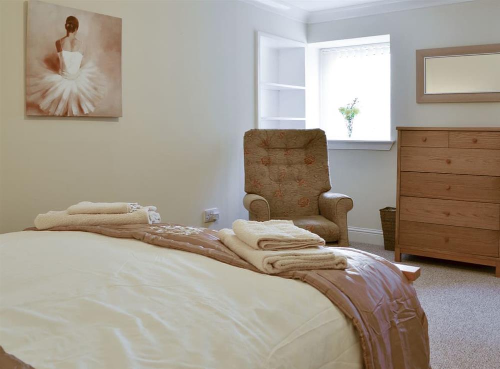 Peaceful double bedroom at Cedar Lodge, 
