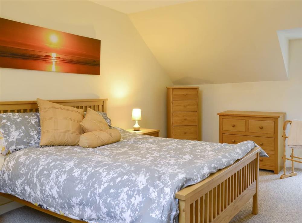 Relaxing first floor double bedroom at Sylvan Cottage, 