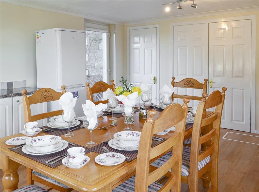 Spacious dining area within kitchen at The Granary, 