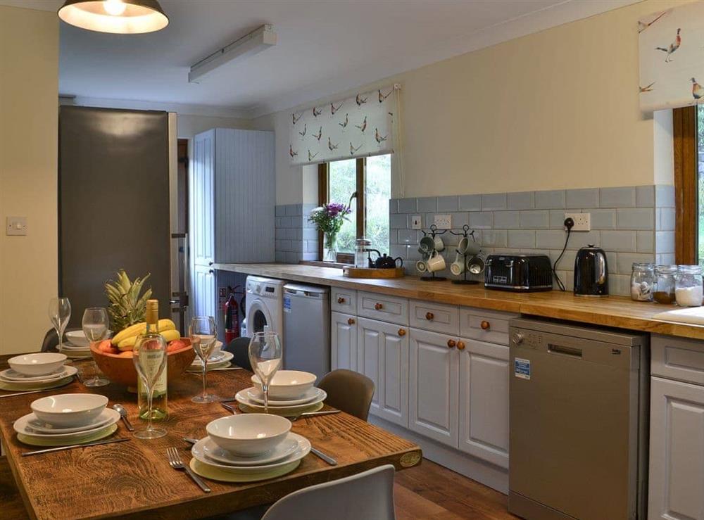 Kitchen with dining area at Rowan House in Camus Inas, Salen, near Acharacle, Argyll