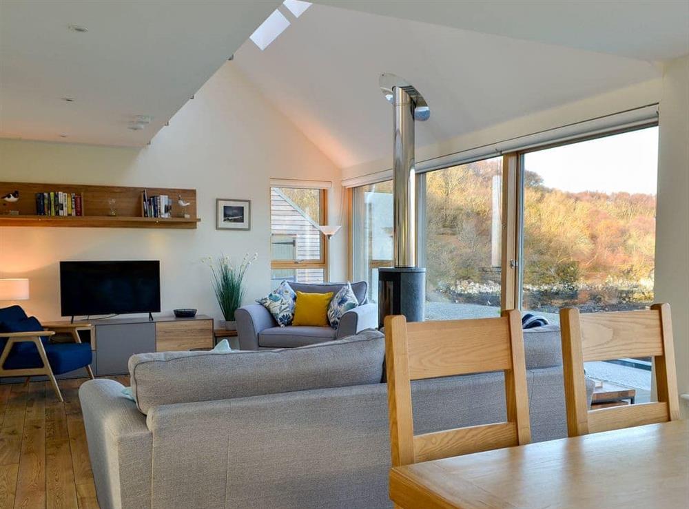 Bright and airy open plan living space at Rowan House in Carbost, near Portree, Isle Of Skye