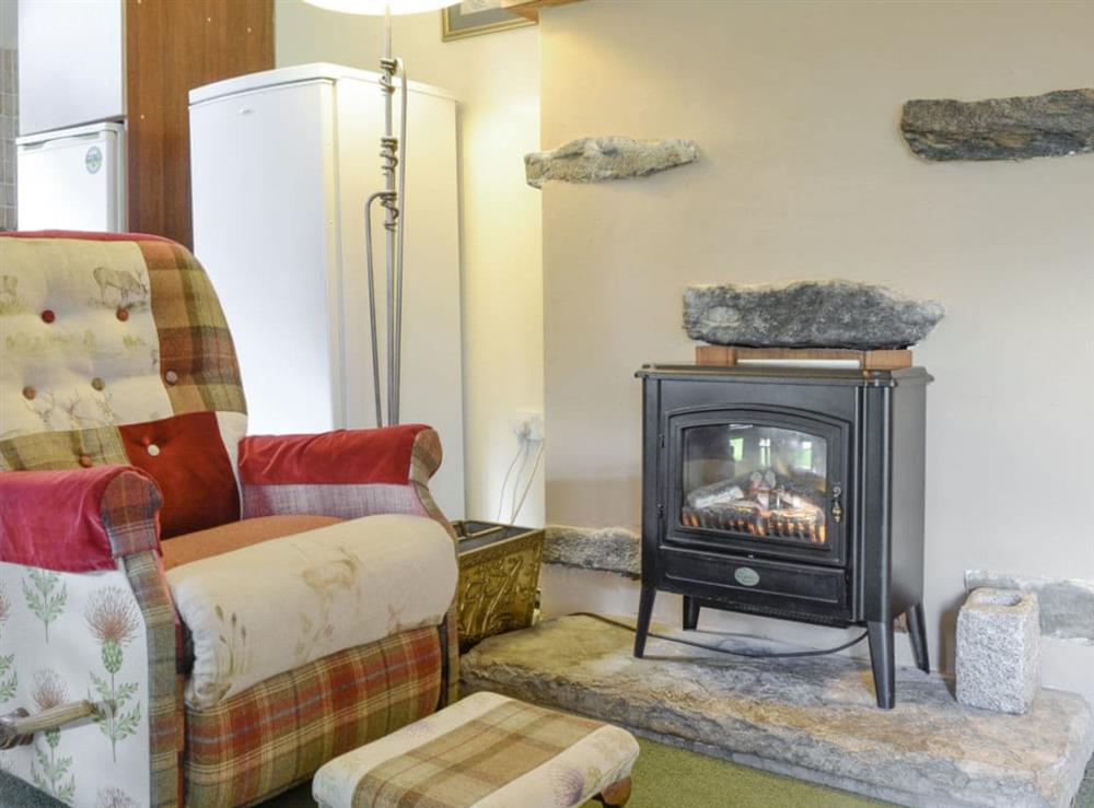 Characterful and cosy living area at Rowan Tree Cottage in Blairgowrie, Perthshire