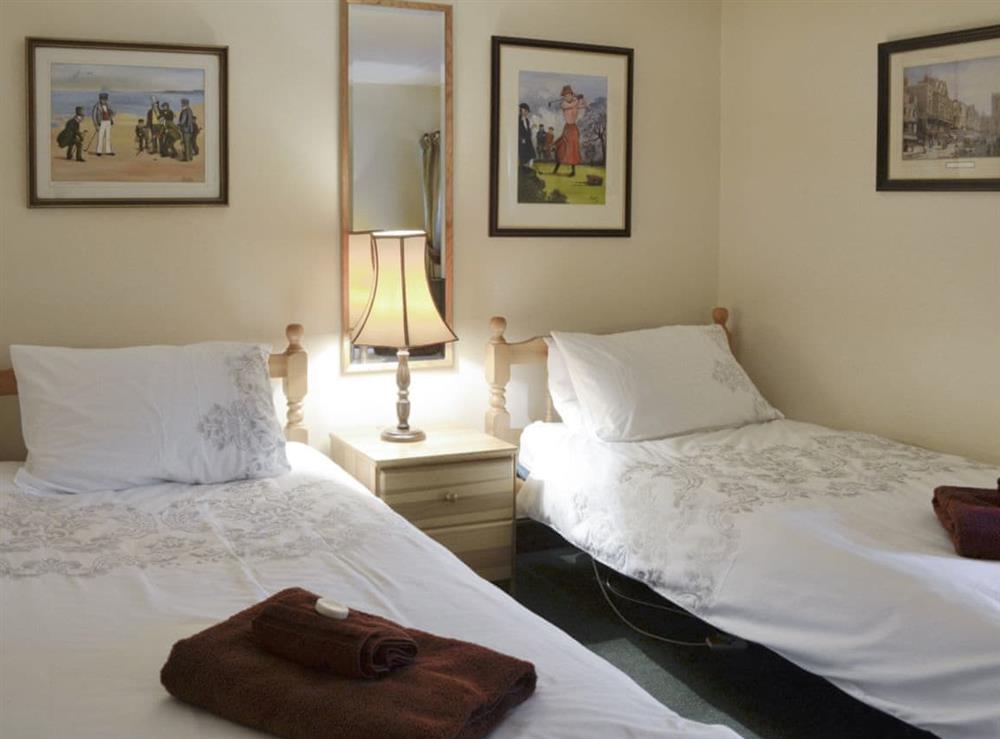 Comfortable twin bedroom at Rowan Tree Cottage in Blairgowrie, Perthshire