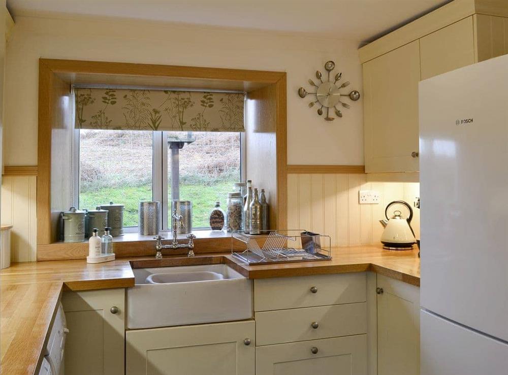 Well-equipped fitted kitchen at Rowan Tree Cottage in Breakish, Isle of Skye., Isle Of Skye