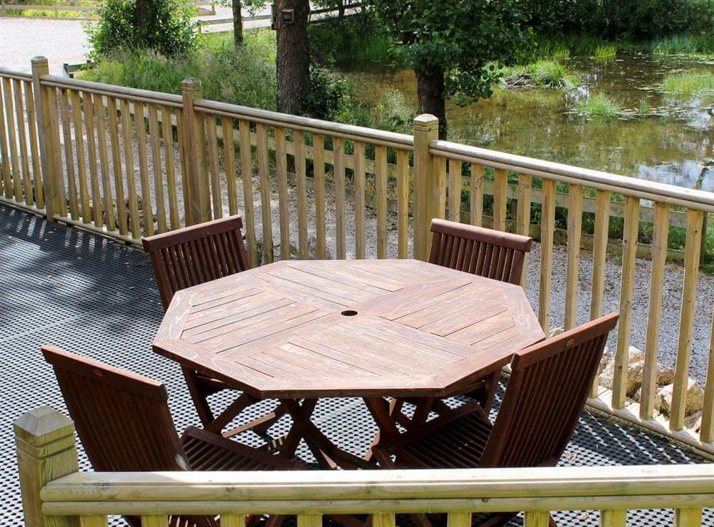 The terrace has a sitting out area, perfect for outdoor entertaining at Rowanburn Lodge in Greystoke, near Penrith, Cumbria