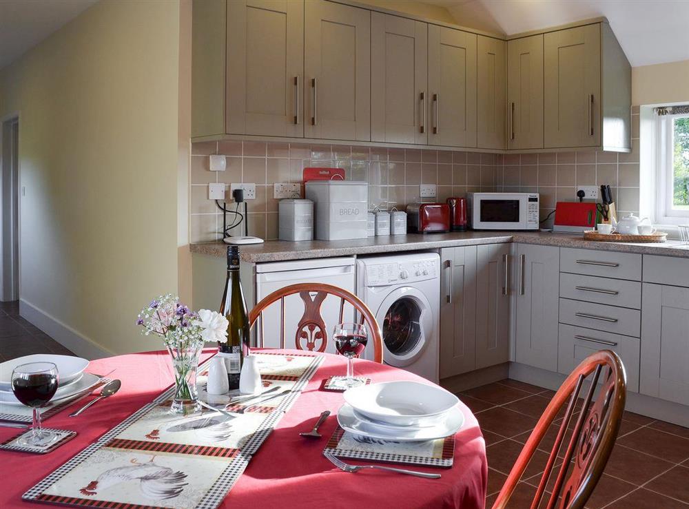 Kitchen with dining area at Rowley Plain Cottage in Brenchley, near Royal Tunbridge Wells, Kent