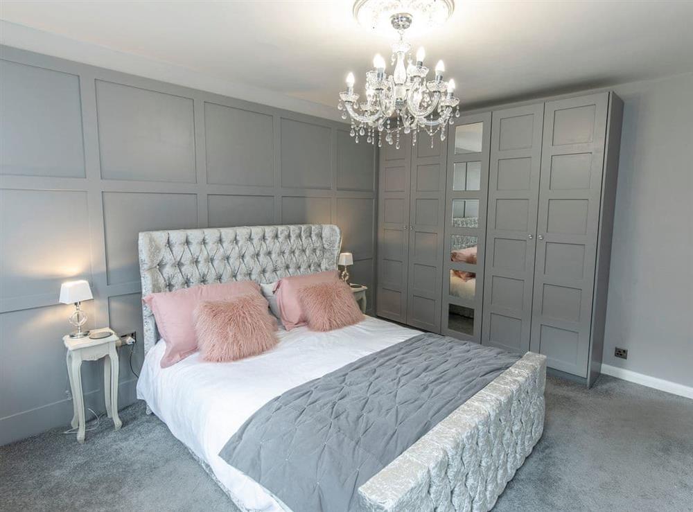 Boutique double bedroom with kingsize bed at Royal Crescent in Whitby, North Yorkshire