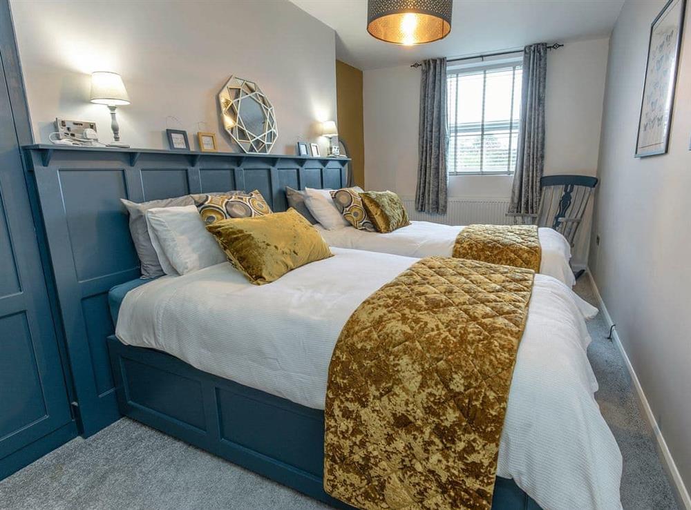 Lavishly furnished twin bedroom at Royal Crescent in Whitby, North Yorkshire