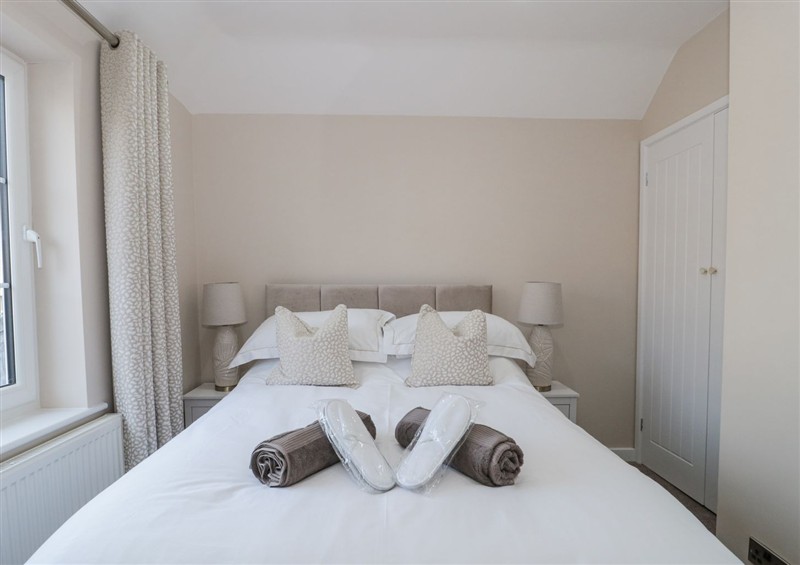 This is the bedroom at Royal Terrace Sunset, Weymouth