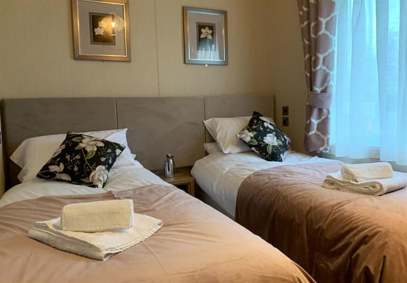 Twin bedroom in Rivendale at Royale Resorts at Ranksborough Hall in Langham, near Oakham