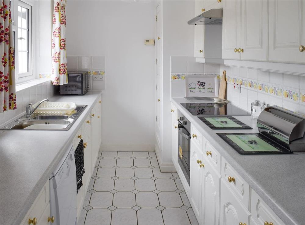 Well-equipped fitted kitchen at Rudda Farm Cottage, 