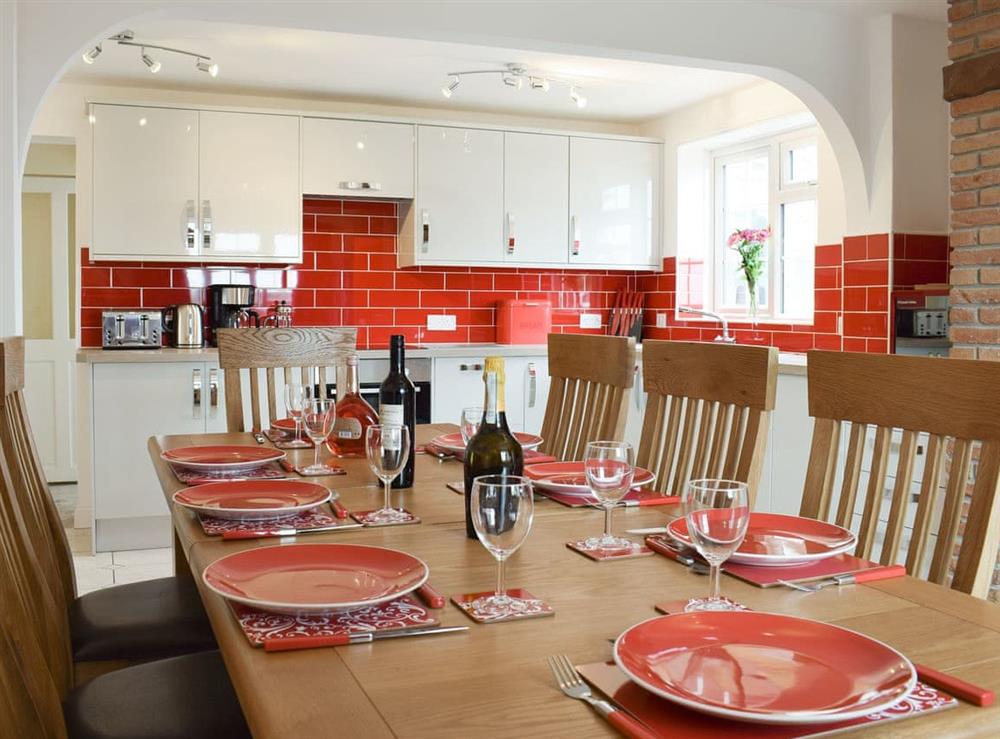 Large dining area with open aspect to kitchen at Rudda Farm House, 
