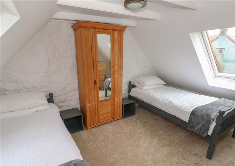 A bedroom in Ruffin Cottage at Ruffin Cottage, Talbenny near Broad Haven