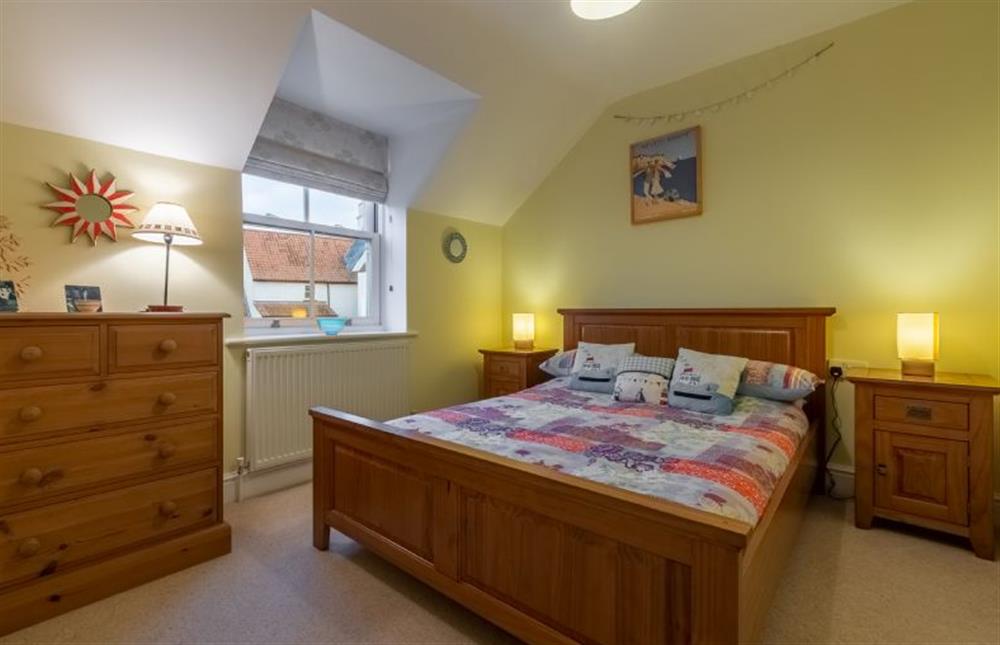 First floor: Bedroom two with a double bed at Rufus Cottage, Dersingham near Kings Lynn