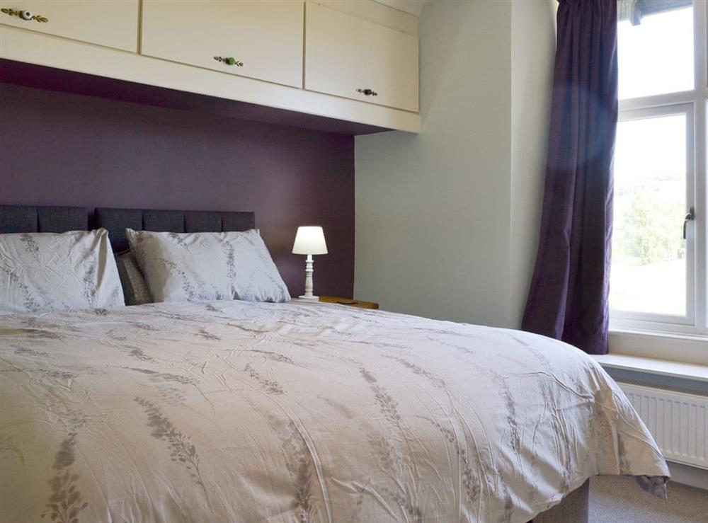 Second bedroom with zip-link beds set as double at Running Hare in Windermere, Cumbria
