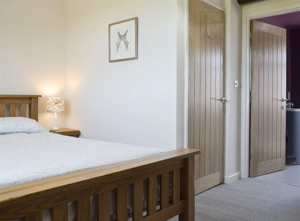 Spacious en-suite master bedroom at Running Hare in Windermere, Cumbria