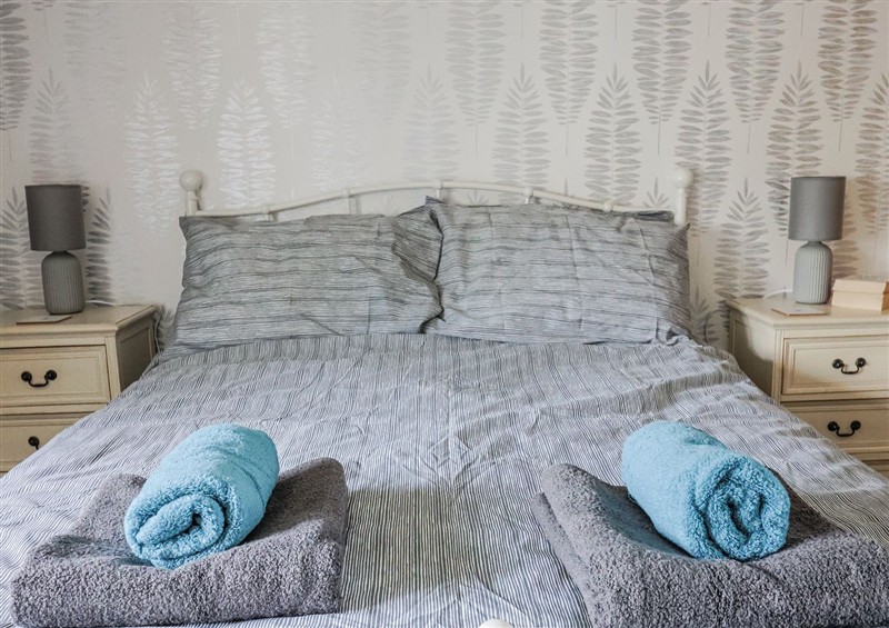 A bedroom in Rushmoor Cottage at Rushmoor Cottage, Colaton Raleigh