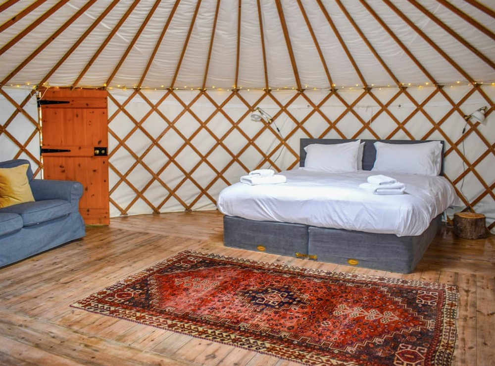Double bedroom at Russet Yurt in Beaminster, Dorset