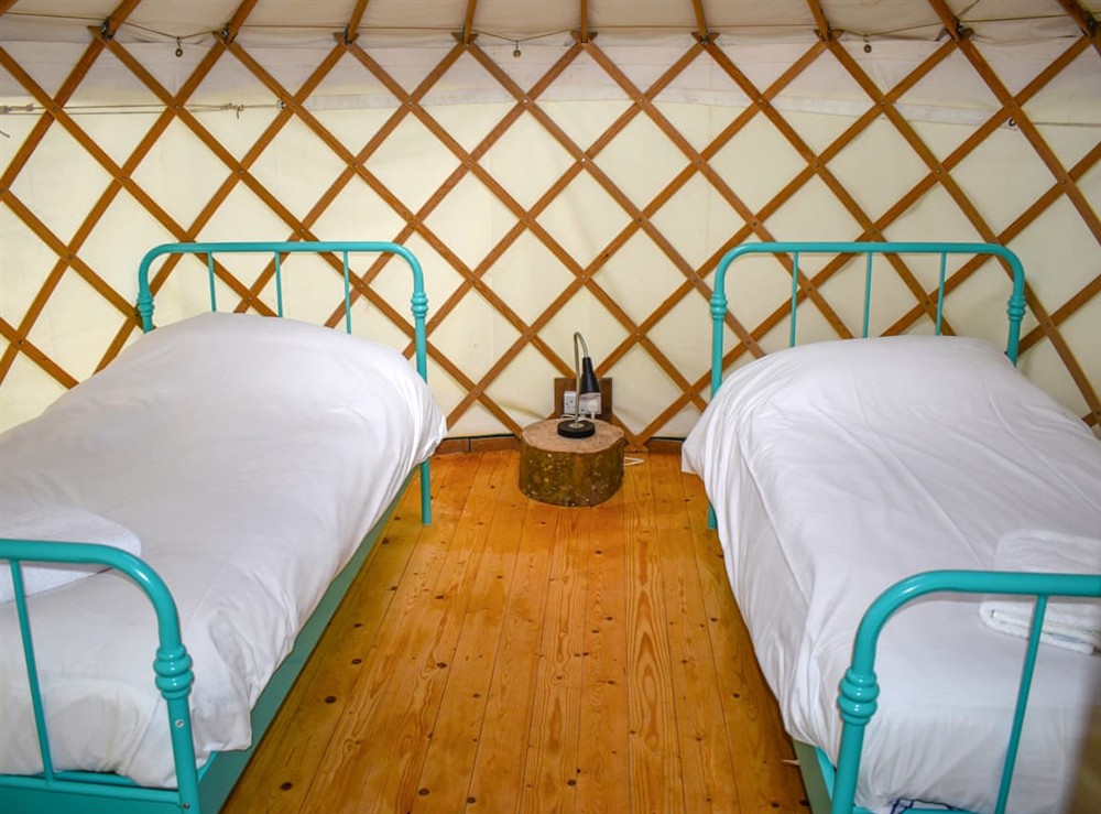 Twin bedroom at Russet Yurt in Beaminster, Dorset