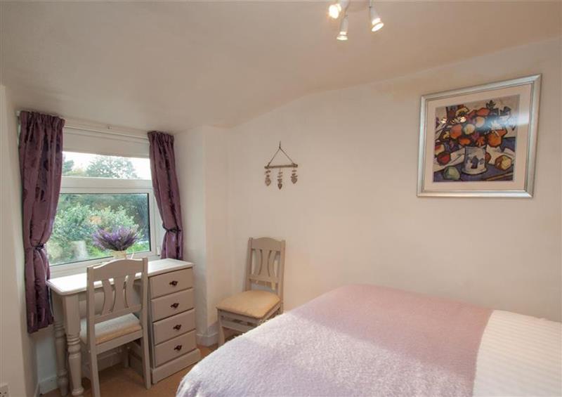 A bedroom in Rustic Cottage at Rustic Cottage, Bowness-On-Windermere