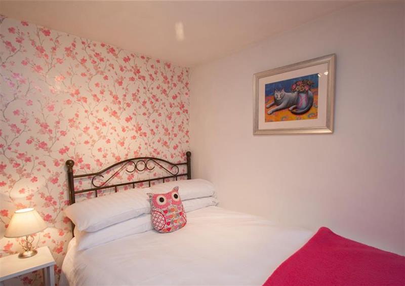 One of the bedrooms at Rustic Cottage, Bowness-On-Windermere