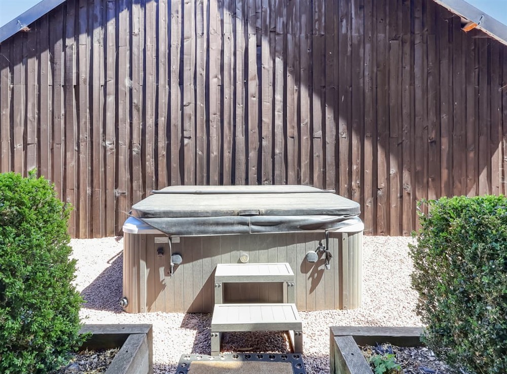 Hot tub at Rusty Barn in Gloucester, Gloucestershire