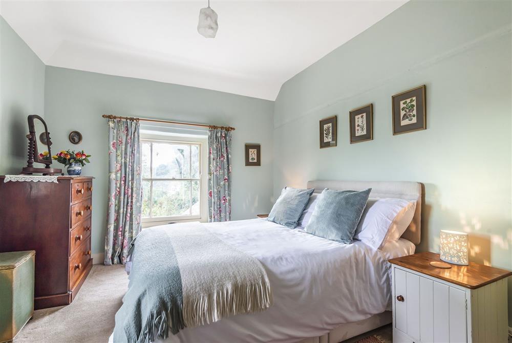 First floor bedroom one with double bed at Ryall Hope Cottage, Bridport