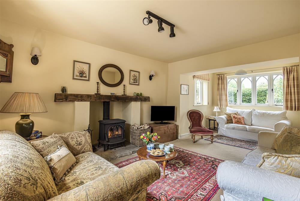 The dual aspect sitting room at Ryall Hope Cottage, Bridport