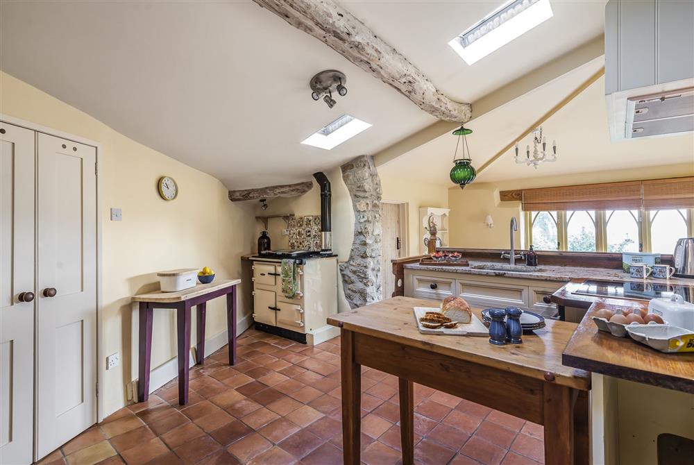 The kitchen with walk-in pantry and separate utility room at Ryall Hope Cottage, Bridport