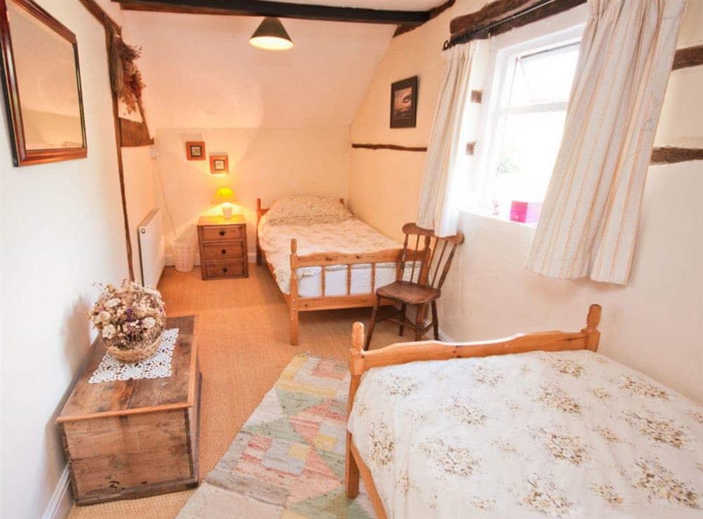Twin bedroom at Rye Court Cottage in Berrow, near Malvern, Worcestershire