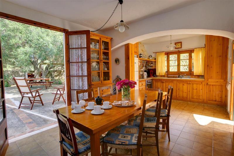The kitchen and dining area at Sa Mosquera, Ciutadella Area, The-Balearic-Islands