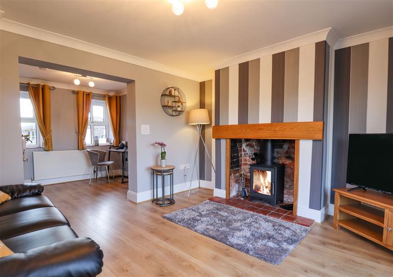 Relax in the living area at Saddle Rack Cottage, Fulstow