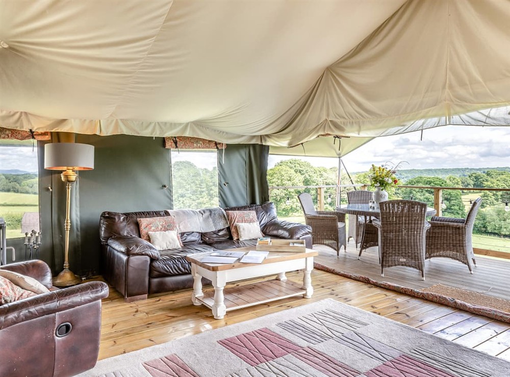 Open plan living space at Safari Tent One in Ross-on-Wye, Herefordshire