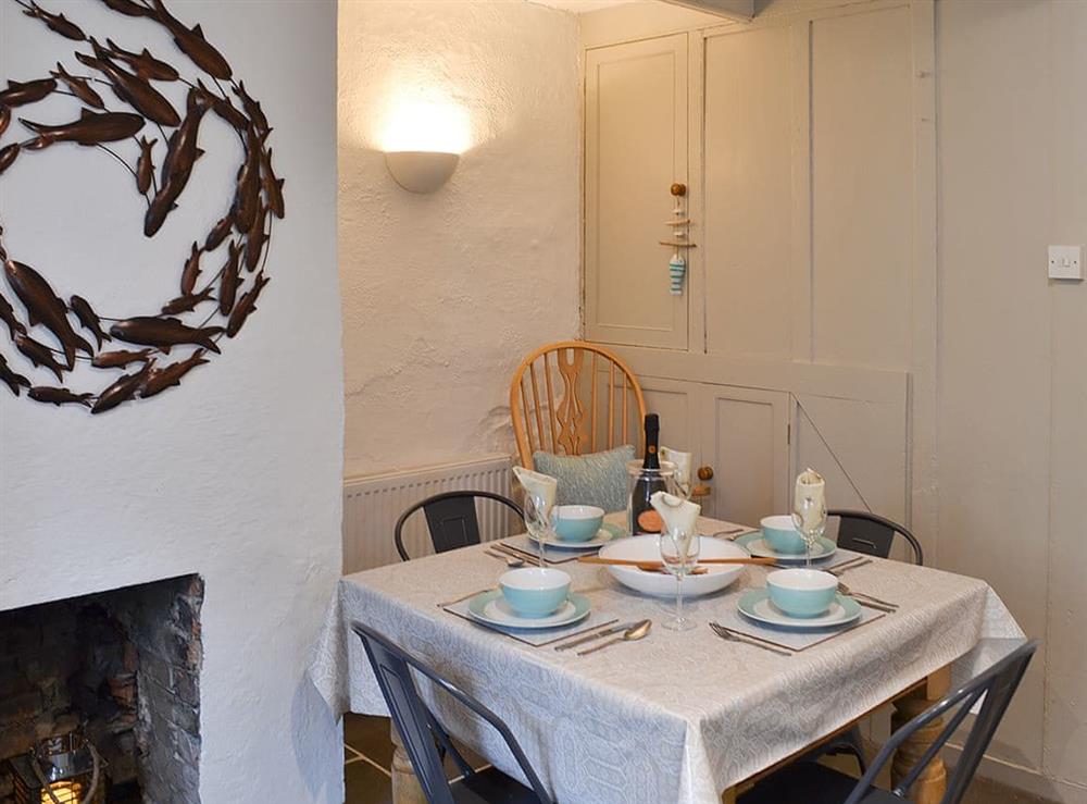 Modest fireside dining area at Sage Cottage in St Columb Major, Cornwall
