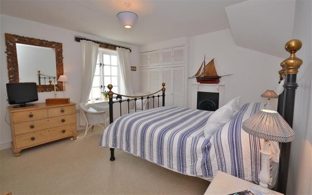 The spacious double bedroom. at Sail Cottage in Beesands