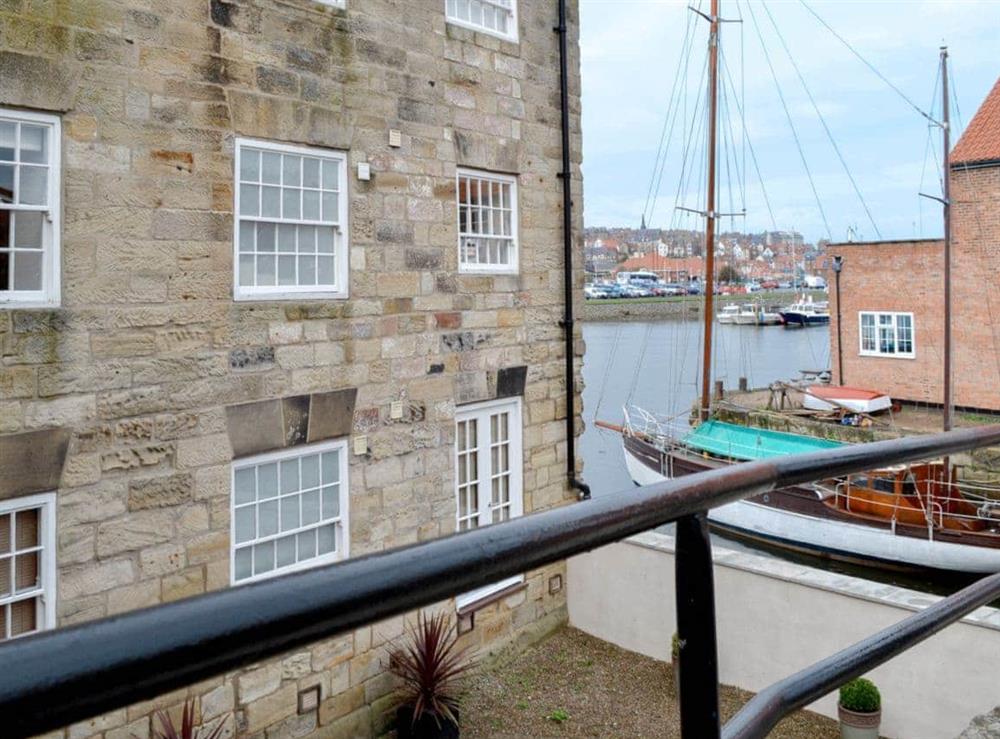 Exterior with a view of the quayside at Sail Loft Apartment in Whitby, North Yorkshire