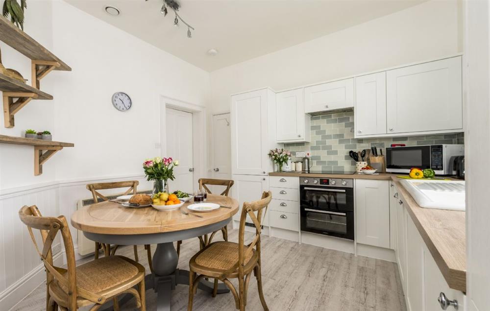 Spacious fully equipped kitchen and dining room at Sally Port Cottage, St Anthonys Lighthouse