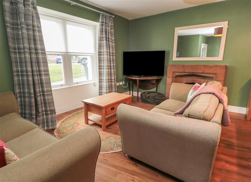 Relax in the living area at Salmon Cottage, Norham