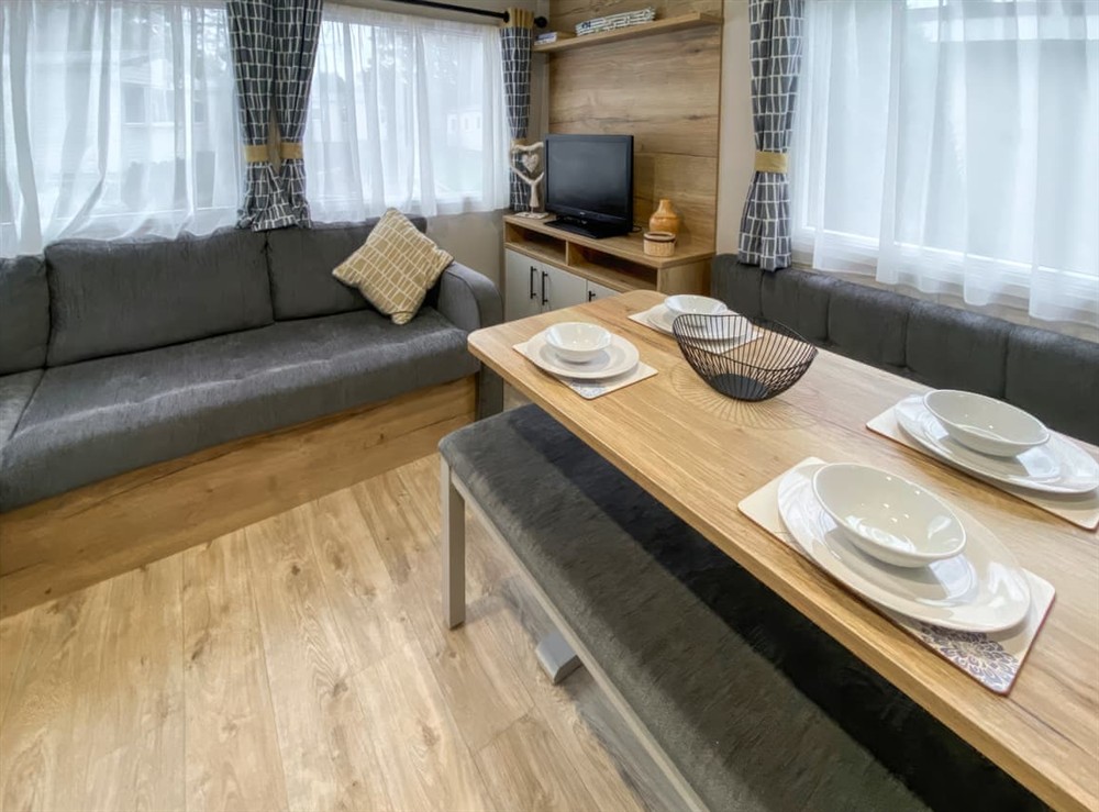 Open plan living space at Giltar 1 The Saltern Holiday Park, 