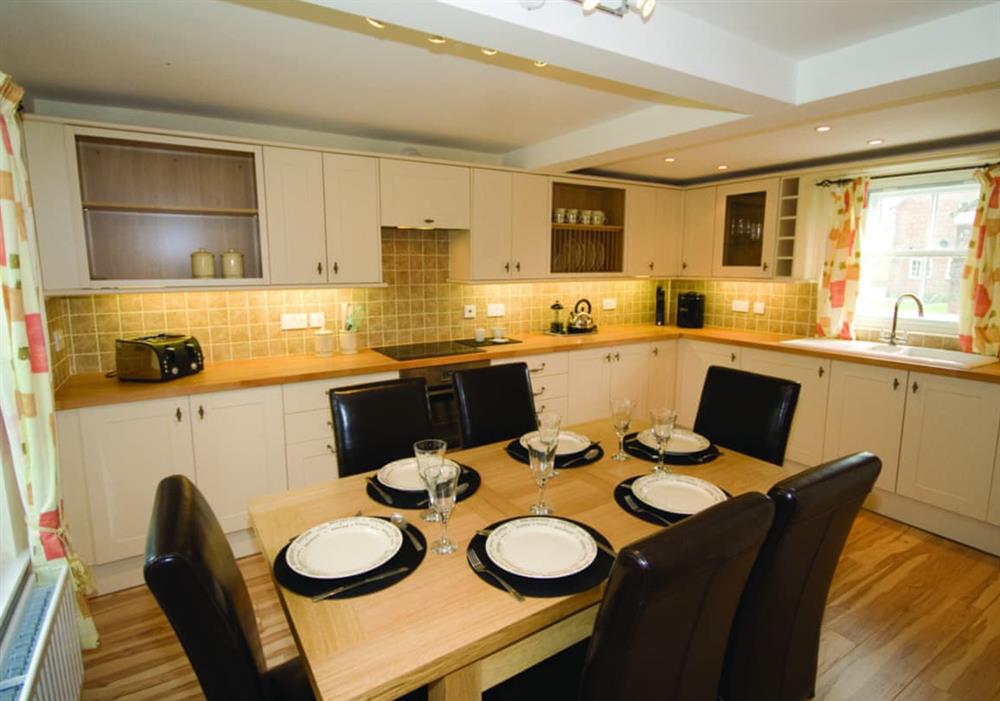 Salters Cottage kitchen with dining area at Salters Cottage in Skegness, Lincolnshire