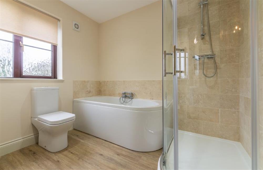 First floor: Family bathroom with separate shower at Saltmarshes, Holme-next-the-Sea near Hunstanton