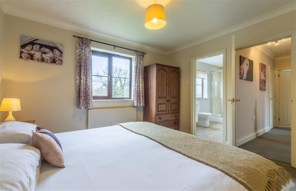 First floor: Master bedroom has en-suite Shower room at Saltmarshes, Holme-next-the-Sea near Hunstanton
